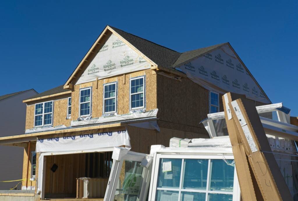 Image shows a new build home next to the description of Nanaimo HVAC solutions for